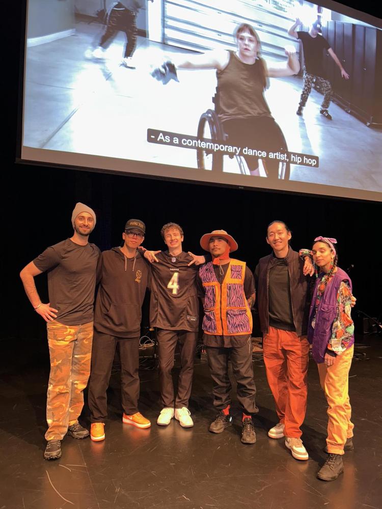 A group of seven hip-hop dancers from various background